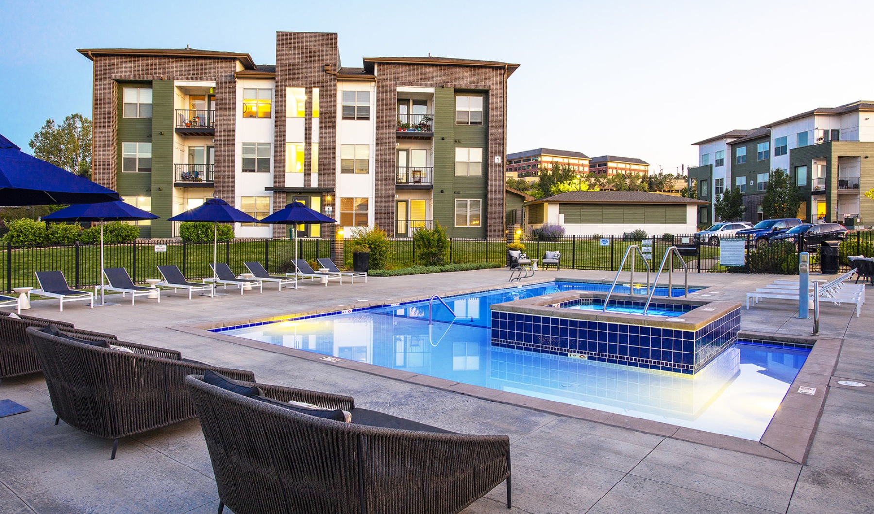 a swimming pool with chairs